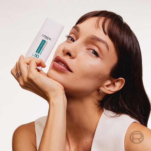 Product Bright Reveal Daily Fluid Tinted Glow Moisturizer SPF50 Pearl 50ml base image